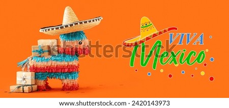 Mexican pinata with sombrero hat and gifts on orange background. Viva Mexico
