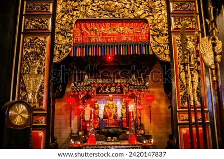 Sign Translate to National People's Congres Bao san on Chinese Worship Altar and Incense inside Tay Kak Sie Temple at Semarang Central Java Indonesia Royalty-Free Stock Photo #2420147837