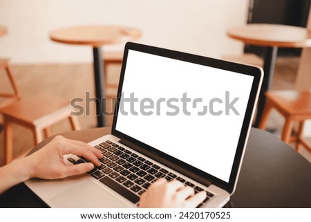 A white blank screen for hand typing text,using laptop contact business searching information in workplace on desk at office. Royalty-Free Stock Photo #2420170525