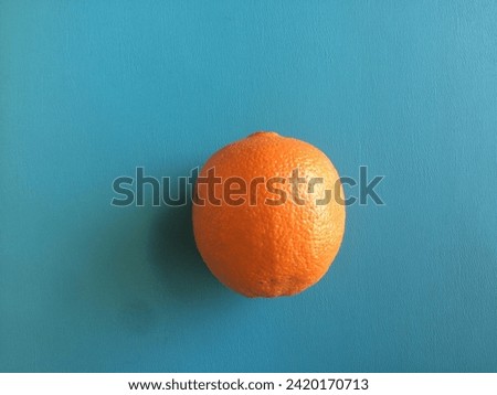 Orange with a shadow high resolution photography.