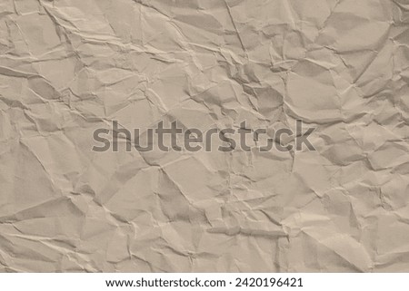 A neutral beige crumpled paper texture that serves as a versatile background.