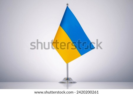 Ukranian flag with a gray and clean background.