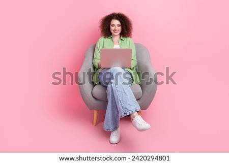 Full length body photo of optimistic cheerful young woman team lead using new macbook pro in dormitory isolated on pink color background Royalty-Free Stock Photo #2420294801