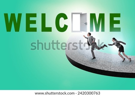 Business people on the road leading to welcome sign