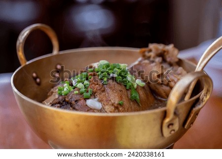 Stewed pork leg or boiled pork leg the one of the favourite food for Chinese food. Chinese ghost festival day food for ancestor passed away warship. Royalty-Free Stock Photo #2420338161