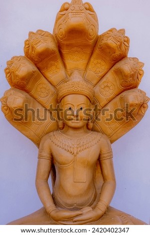 Traditional Thai style Buddha statue for worship in Thai temple