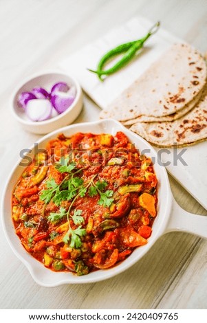 Indian food Curry sevtamatar, cabbage, Chiken Tikka, Biryani, Vegetable Curry, Papad, Dal, Palak Sabji, Jira Alu, Rice Royalty-Free Stock Photo #2420409765