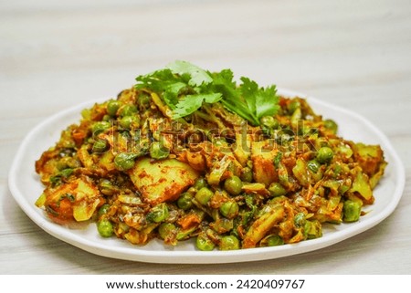 Indian food Curry sevtamatar, cabbage, Chiken Tikka, Biryani, Vegetable Curry, Papad, Dal, Palak Sabji, Jira Alu, Rice Royalty-Free Stock Photo #2420409767