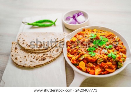Indian food Curry sevtamatar, cabbage, Chiken Tikka, Biryani, Vegetable Curry, Papad, Dal, Palak Sabji, Jira Alu, Rice Royalty-Free Stock Photo #2420409773