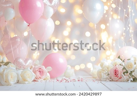Valentines Day celebration backdrop with pastel pink and white balloons, heart-shaped decorations, white roses, and twinkling lights.
