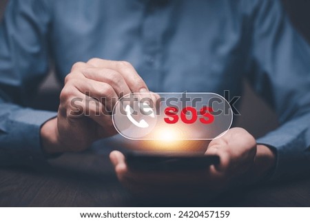 man using Smart Phone with Emergency app in home, call phone, Chat message icon, Emergency application from smartphone for elderly, technology concept.Old hand touch mobile phone and call for help. Royalty-Free Stock Photo #2420457159