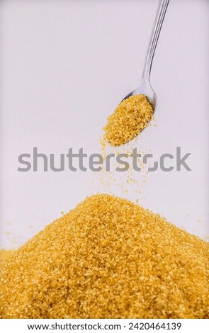 This is a picture of a pile of sugar falling down.