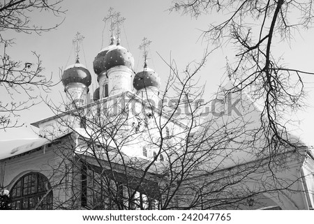 Old architecture of Kolomenskoye park in Moscow, Russia, in winter. Black and white photo.