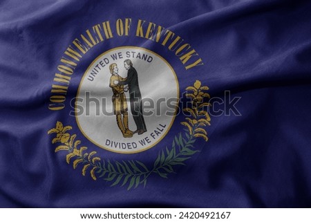 waving colorful national flag of kentucky state. macro shot