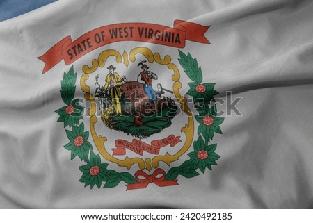 waving colorful national flag of west virginia state. macro shot