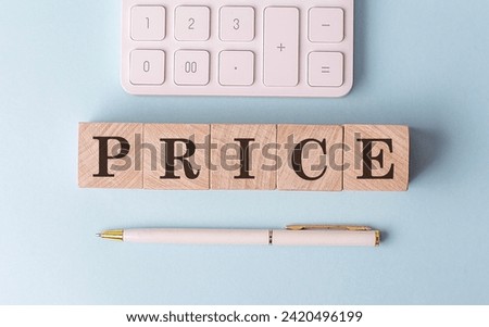 PRICE on a wooden cubes with pen and calculator, financial concept