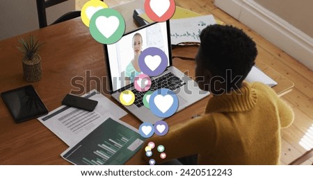 Image of digital social media heart icons over woman using laptop on image call. Digital interface global connection and communication concept digitally generated image.