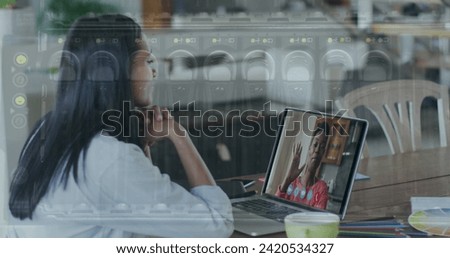 Image of close up of computer server over woman using laptop on image call in background. Digital interface global connection and communication concept digitally generated image.