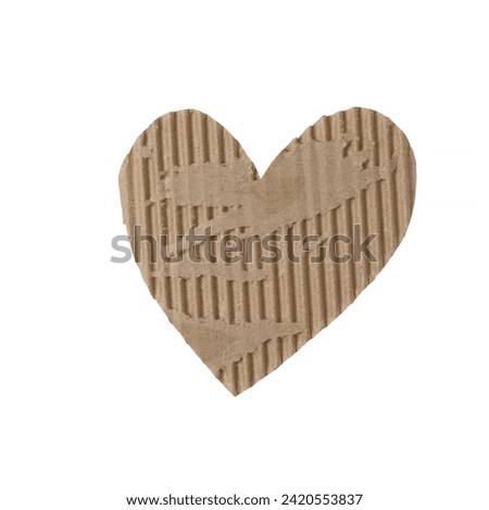 Cardboard heart on a white isolated background. Stock photo for the day of St. Valentine with empty space for your text. For print, postcards and wallpaper