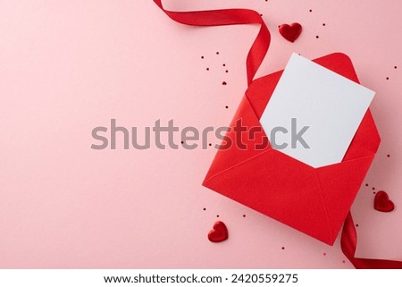 Ultimate surprise for a lady. View from top of a deluxe red envelope, romantic message, satin ribbon, heart shapes, and sparkles on a gentle pink surface, with space for text