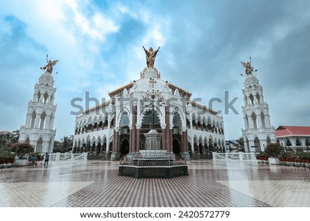A Front view of the Exquisite St George Forane Church Church a popular pilgrim destination for the natives and tourists visiting Kochi in Kerala India. Royalty-Free Stock Photo #2420572779