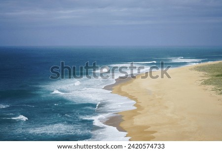                                Atlantic Ocean, waves and beach. Sunny picture. Surfing beach