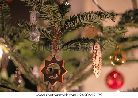 Picture of Christmas tree decorations on a traditional German fir tree at Christmas time