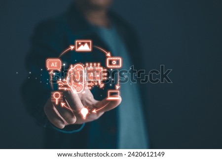 Man hold icon ai, Marketers education, research, analyze media video streaming content creation and online marketing strategies to grow their digital business. artificial intelligence concept. Royalty-Free Stock Photo #2420612149