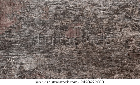 Surface texture of old plywood with traces of paint in panoramic format. Royalty-Free Stock Photo #2420622603