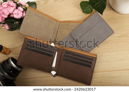 Colorful man wallet. Concept shot, top view, different colors man wallet. Special background man wallet view. Men fashion and accessories.