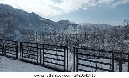 Shining mountains covered under snow