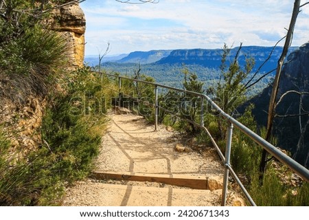 Prince Henry Cliff Walk from Katoomba to the Three Sisters rock formation in the Blue Mountains National Park, New South Wales, Australia Royalty-Free Stock Photo #2420671343