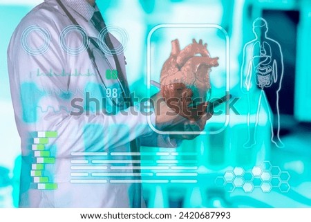 concept. A doctor holds a virtual scanner of a patient's heart, and observes vital signs from a tablet.