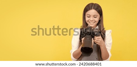 school of photography. hobby or future career. photographer beginner. Child photographer with camera, horizontal poster, banner with copy space. Royalty-Free Stock Photo #2420688401