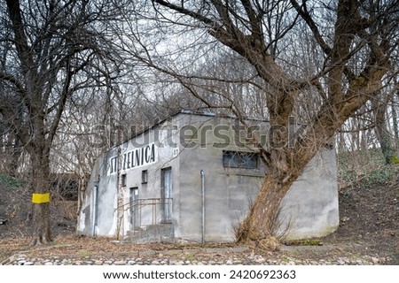 Abandoned military building - shooting range, inscription: "Shooting range" Royalty-Free Stock Photo #2420692363