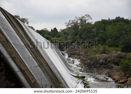 Side view of a spilling dam