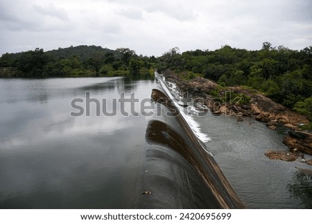 Side view of a spilling dam