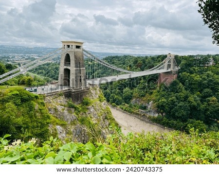 The history of the Clifton Suspension Bridge is interesting, rich and fascinating, with a story that begins in 1754. The Clifton Suspension Bridge Trust is custodian to both the bridge itself and its  Royalty-Free Stock Photo #2420743375