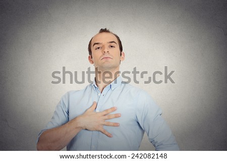 Closeup portrait arrogant aggressive bold self important uppity stuck up man with napoleon complex, short man syndrome isolated grey wall background. Negative emotion facial expression feelings Royalty-Free Stock Photo #242082148