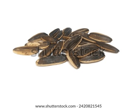 image of a bunch of sunflower seeds on a white background