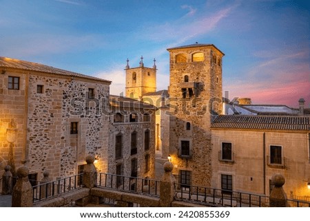 View of the Plaza de San Jorge, with the Tower of the Los Golfines de Abajo palace as the protagonist, in Cáceres, Extremadura, Spain, a city declared a world heritage site by UNESCO Royalty-Free Stock Photo #2420855369