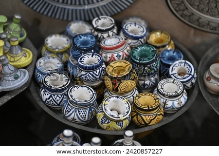 Colorful ceramic and pottery products in a traditional shop in a souk in the medina (Old Town) of Marrakech
The historic district of the medina is listed as a UNESCO world heritage site. Royalty-Free Stock Photo #2420857227