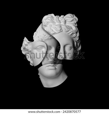 Female plaster statue heads inside broken male one over black background, contemporary collage. Antiquity and modernity, transgender and diversity concept
