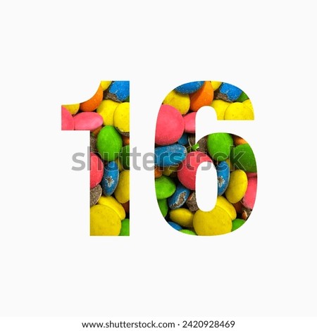 Number sixteen of colourful candies and paper cut in shape of sixteenth digit isolated on white. Rainbow typeface