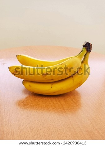 Ripe bananas. Exotic tropical yellow fruit. Banana is a symbol of health care and wellbeing.