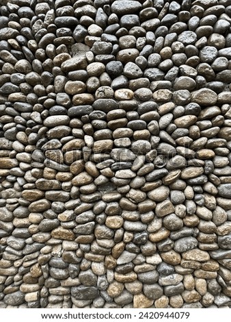 Stone in a wall that look like abstract background. I took this picture on bogor Indonesia in Jan 2024