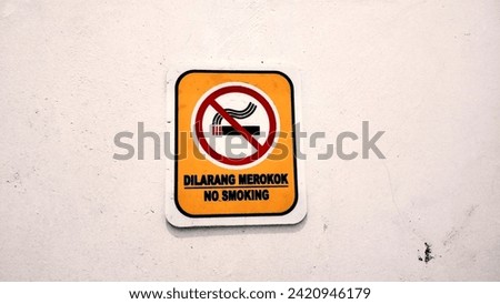 No smoking signs are posted on the walls