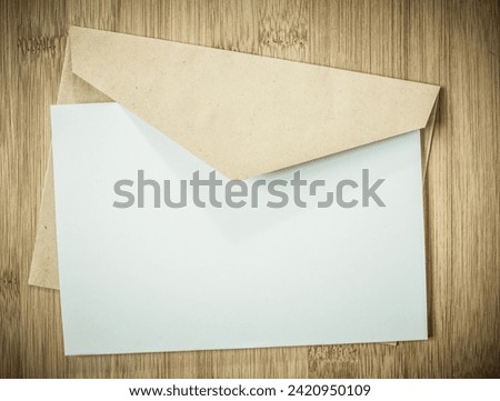 blank greeting card  invitation mockup with craft paper envelope  feminine still life composition