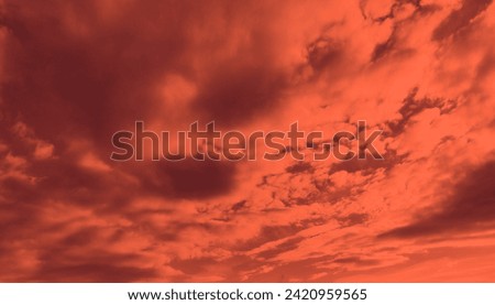 Dramatic sky with clouds, natural background for text, red and orange color