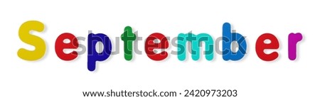 September word in coloured magnetic letters